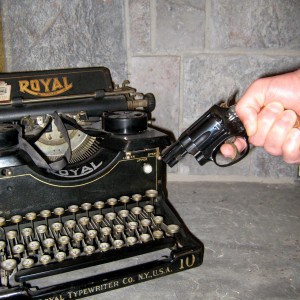 Typewriter and gun